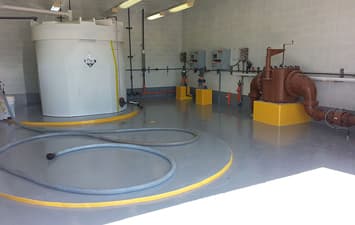 Piso industrial protegido con sistema polimérico ENECON